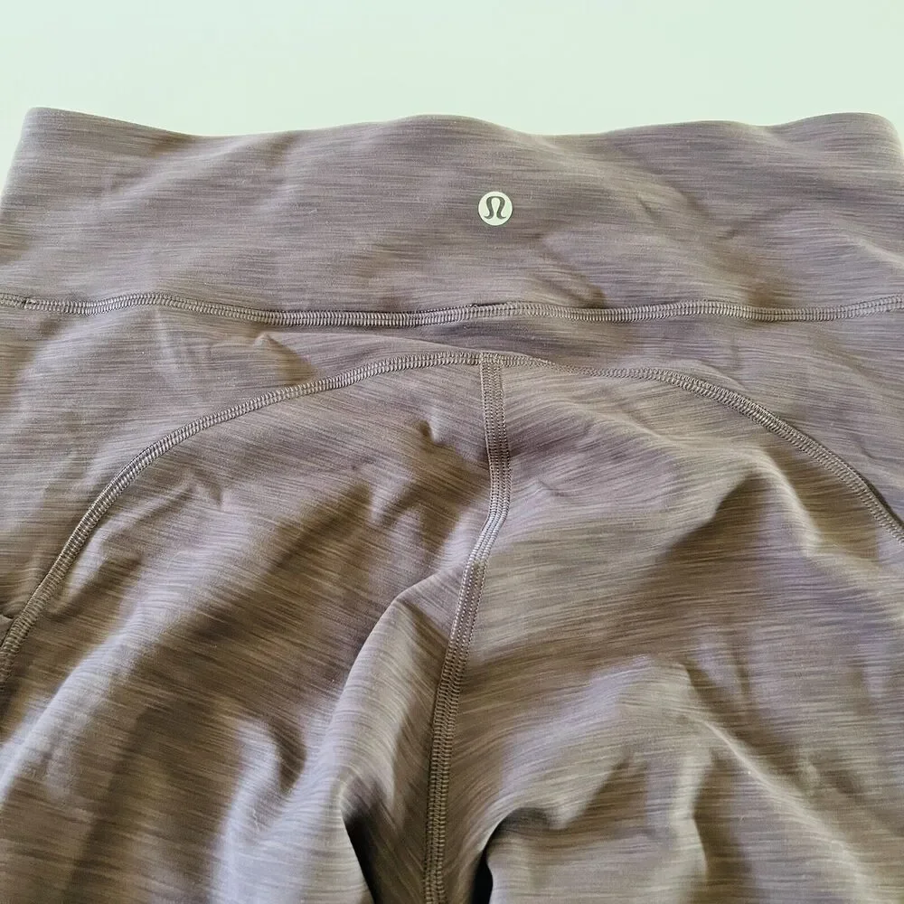 LULULEMON ATHLETICA Heathered Currant Invigorating HR Crop 23